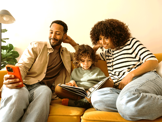 loans family sofa family-sitting-on-a-sofa