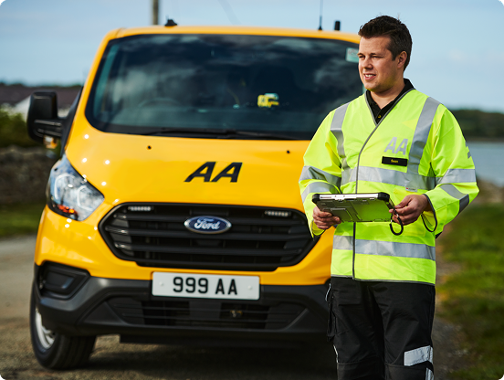 How our cover works An AA patrol stands in front of his van, holding a clipboard.