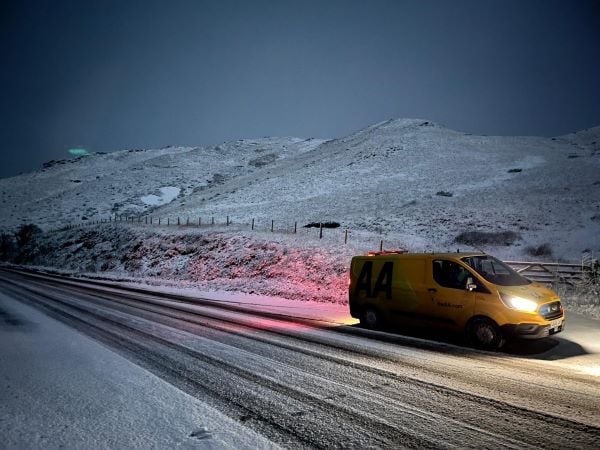 Aa van on snowy road