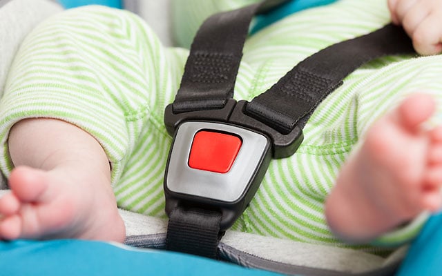 Children undoing belts and buckles