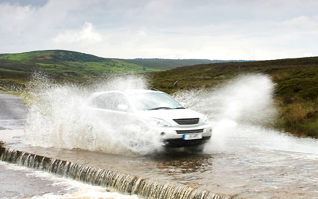 How to drive through floodwater and heavy rain The AA